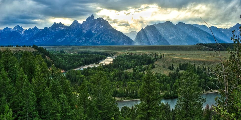 The Snake River, in the foreground of the Teton Range, as it rises from the sagebrush covered valley.