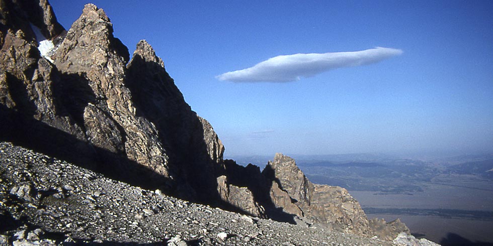 Hard, crystalline metamorphic granite and gneiss in the Tetons produce spires and jagged ridges.