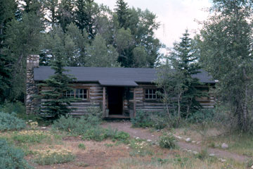 Meeting at Maud Noble’s cabin to discuss preserving the regions “Old West” character